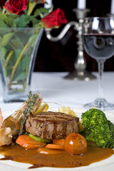Surf 'n' turf a la carte meal with red wine