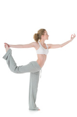 Young woman doing yoga, Lord of the Dance / Natarajasana positio