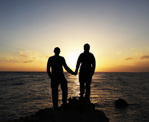 Fototapeta na wymiar Couple on sunset
