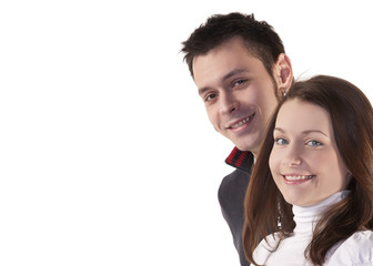 Portrait of a young couple posing in studio