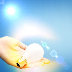 Background with lit lightbulb