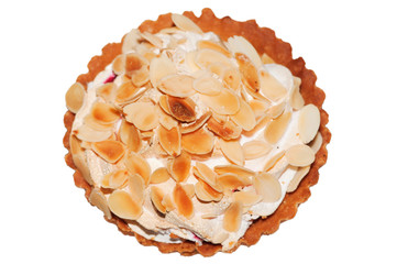 small cake with meringue and almond chips isolated on white