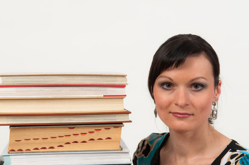 Attractive girl portrait with books