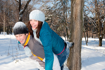 Couple playing in snow