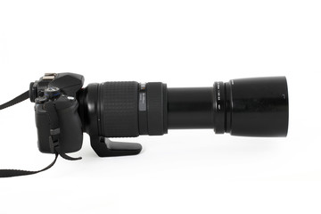Profile of digital SLR with long telephoto lens