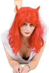 Young red haired woman in a wig and lingerie