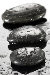 spa stones with water drops