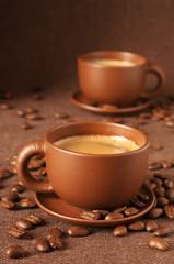 Cups of coffee and beans