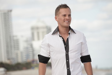 Fototapeta premium Handsome man smiling outside
