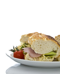 baguette sandwich with cheese, tomato, and avocado