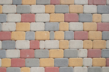 Texture multi-coloured rectangular pavement tiles