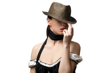 Portrait of young beautiful woman wearing hat