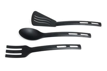 Black kitchen tools over white background