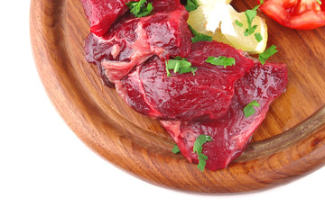 beef ribs on wooden plate