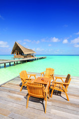 chair and table at beach of maldives