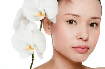 Young and attractive woman with flowers