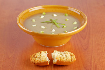 Cream of mushroom soup and bread croutons