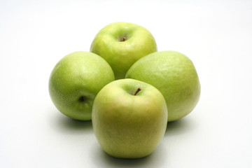 Four green apples