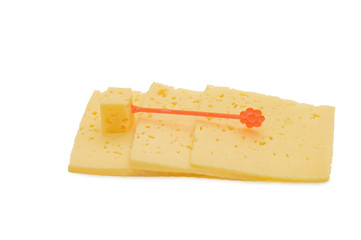 Cheese pieces isolated on white background