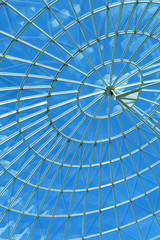 Blue Sky Through a Modern Architecture Round Spiral Window