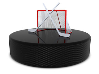 Hockey sticks and goal on the puck