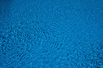 Fototapeta na wymiar Streaming fresh water in swimming pool