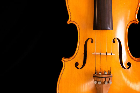 waist of violin on black