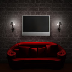 Red couch with LCD tv and sconces in minimalist interior