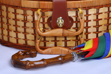 Picknick basket with a colourful umbrella