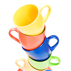 Color cups isolated on white background.