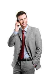 Happy business man talking on mobile