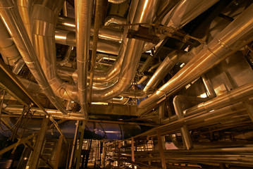 Pipes, tubes, machinery and steam turbine at a power plant