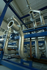 Pipes, tubes, machinery and steam turbine at a power plant