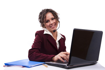 Woman with headset and laptop