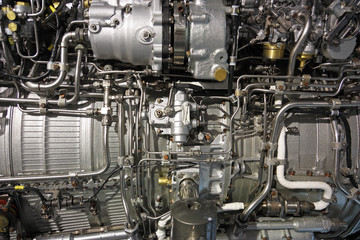 Fototapeta na wymiar Szczegółowy ekspozycji turbo silnik odrzutowy. Technogenego tło.