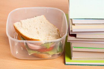 Sandwich and books