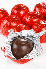 chocolate candy in red foil.