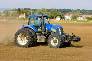 Fototapeta premium tractor on field, Czech Republic