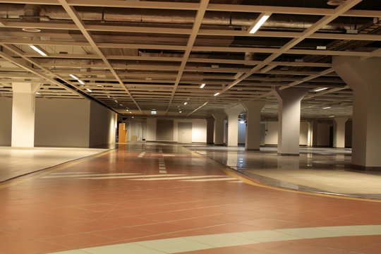 Empty parking of cars in an underground floor of office building