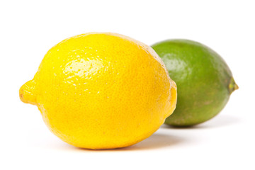 yellow lemon and green lime isolated on white