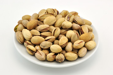 Pistachio appetizer on white plate