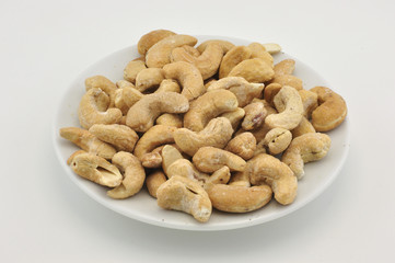 Indian nuts on white plate