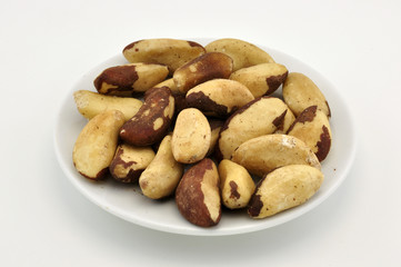 Brasilian nuts apetizer on white plate