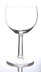 Empty wine glass on white background