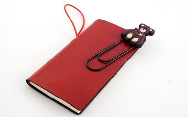 Red notebook with clip