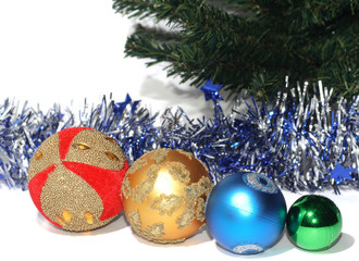group of Christmas Baubles with silver tinsel.