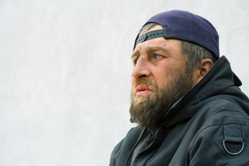 Portrait of homeless man.