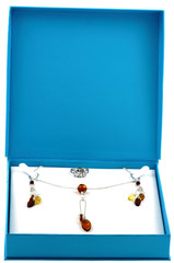 parure bijoux ambre argent écrin bleu fond blanc