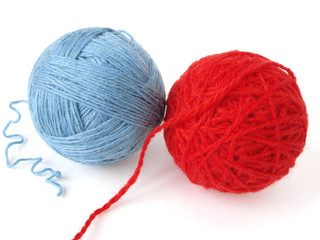 red and blue wool balls