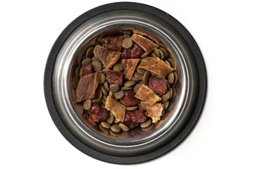 Top view of bowl of dog food isolated with clipping path